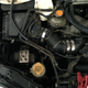 hose just off the reservoir cap was spraying fluid dead ahead at the radiator.